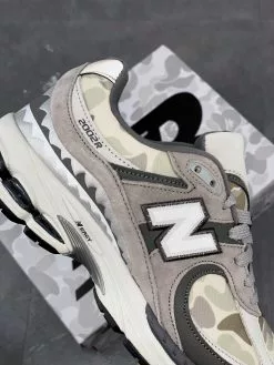 BAPE X New Balance 2002R ‘Apes Together Strong-Grey Camo’ For Sale -Cheap Jordan Shop BAPE x New Balance 2002R Apes Together Strong Grey Camo For Sale 2
